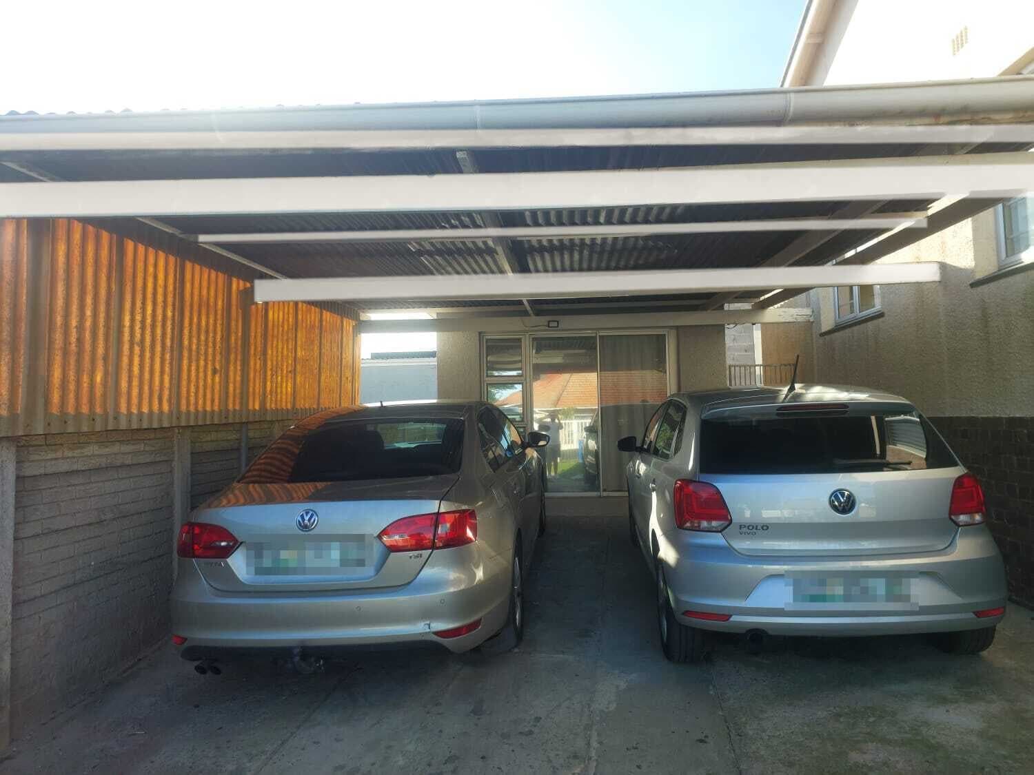 Double carport with steel frame and roof sheeting built by Elite Home Finishes